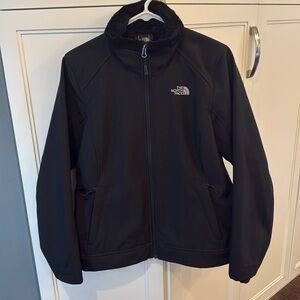 Women’s The North Face black Zip Up Coat Size M.